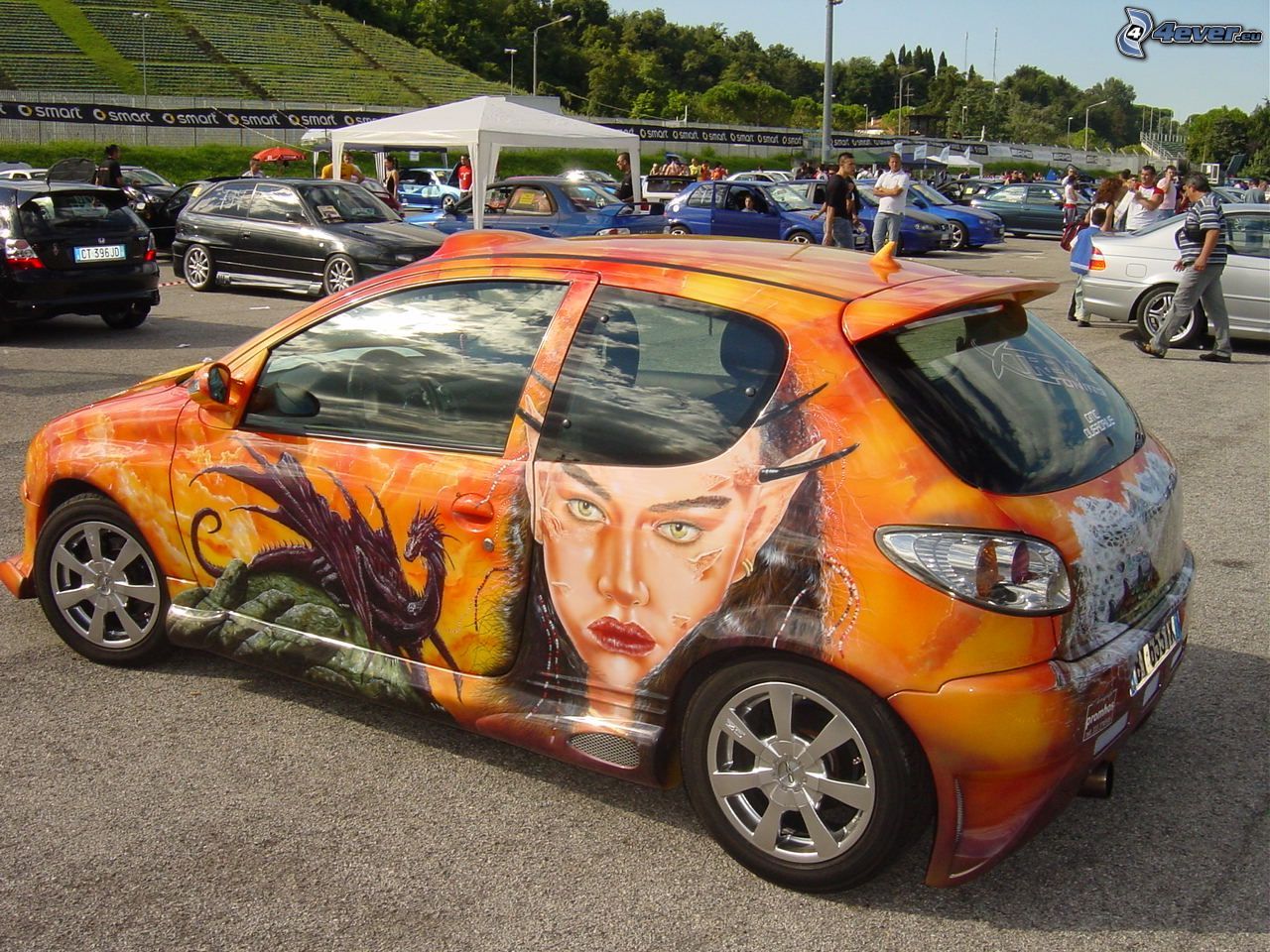 http://pictures.4ever.eu/data/download/cars/tuning/peugeot-206,-tuning-125153.jpg?no-logo