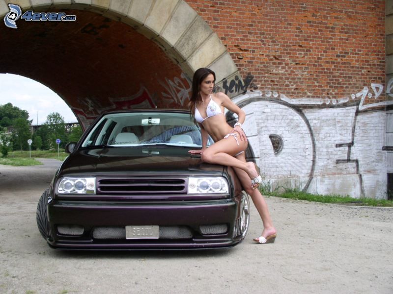 http://pictures.4ever.eu/data/download/cars/tuning/volkswagen-golf-2,-sexy-girl-131508.jpg?no-logo